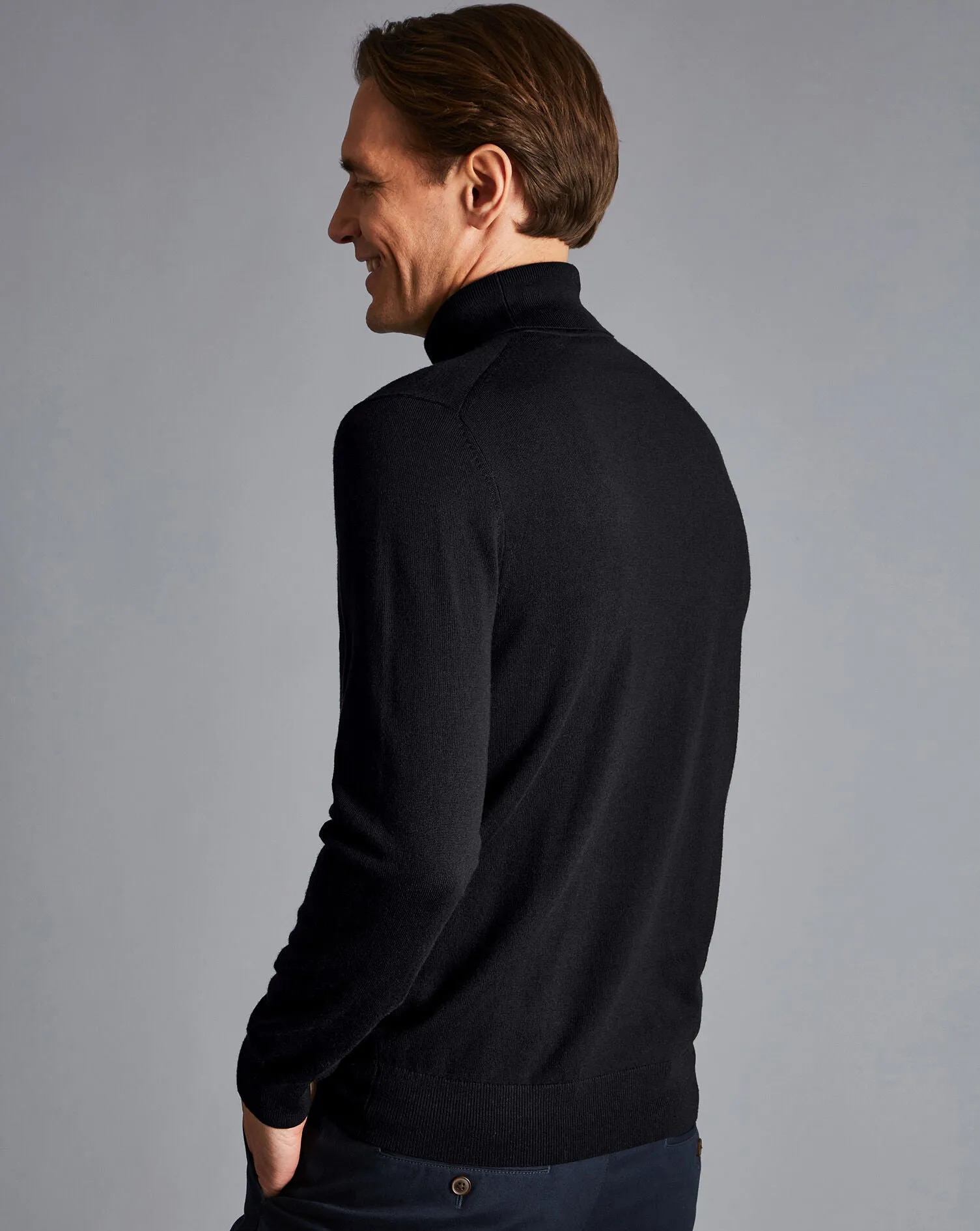 BLACK PURE MERINO ROLL NECK JUMPER